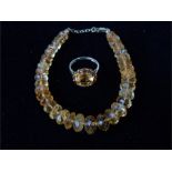 A vintage, 9 ct yellow gold citrine ring and bracelet