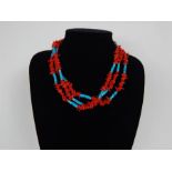 A coral and turquoise necklace