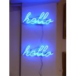 A pair of Hello neon lights; 36 cm wide