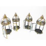 A set of four, contemporary, storm lanterns