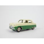 A Dinky Toys Ford Zephyr Saloon (162) in two tone green and with original box.