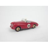 A Dinky Toys Sunbeam Alpine Sports with driver (107) in red with original box (missing some end