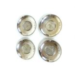 Four Britannia standard silver dishes; 9 toz