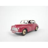 A Dinky Toys Morris Oxford in two tone red and white with original box (missing some end flaps).