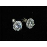 A pair of silver and cubic zirconia stud earrings