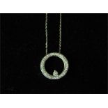 A diamond pendant necklace A 14K white gold chain.