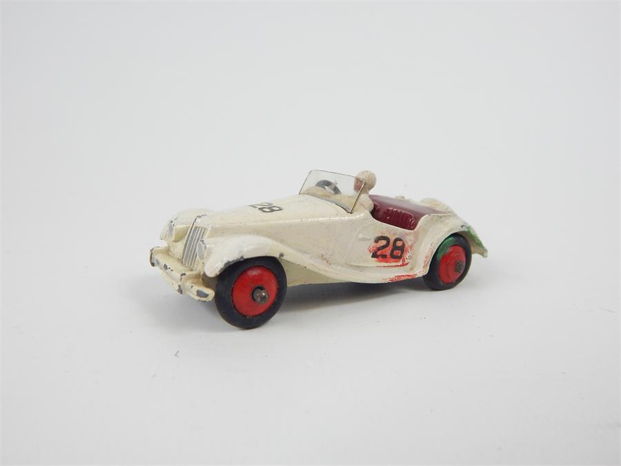 A Dinky Toys M.G. Midget Sports (108) in white with possible over painted repairs, with original box