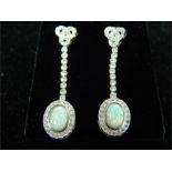 A pair of CZ and opalite drop earrings; stamped "S925".