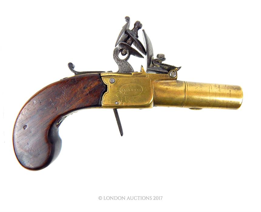 A Nicholson of London, pocket brass flintlock pistol with and walnut stock; unscrewable style barrel