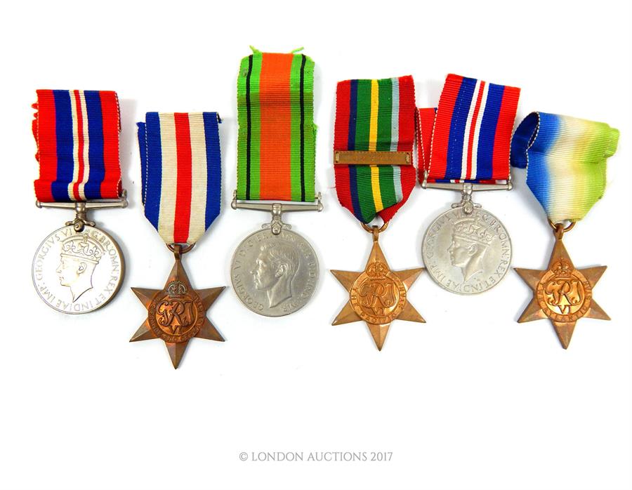 A group of six medals belonging to Sub Lieutenant R.S Hardman as well as two notifications of - Image 2 of 2