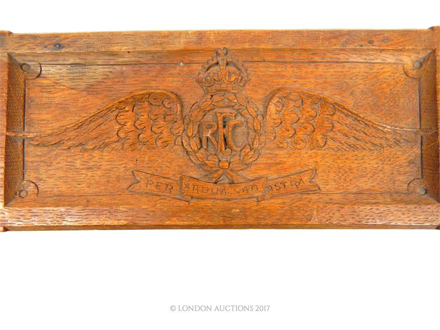 A homemade WW1 RFC carved wooden scribe box; with the RFC insignia carved upon its top; 23cm wide. - Image 2 of 3