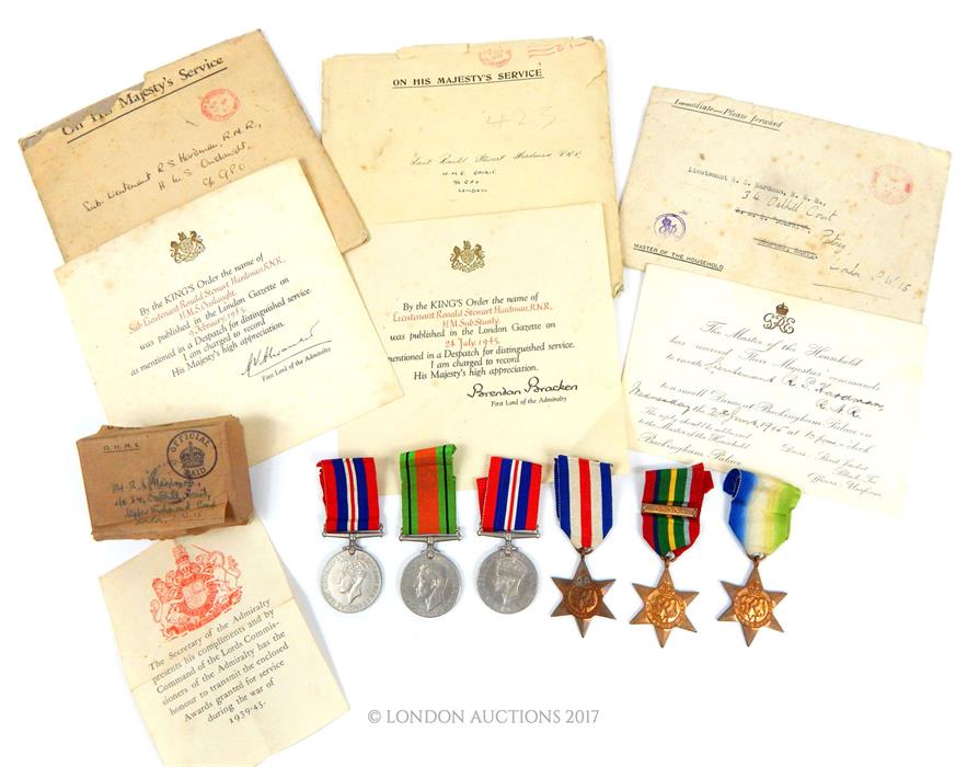 A group of six medals belonging to Sub Lieutenant R.S Hardman as well as two notifications of