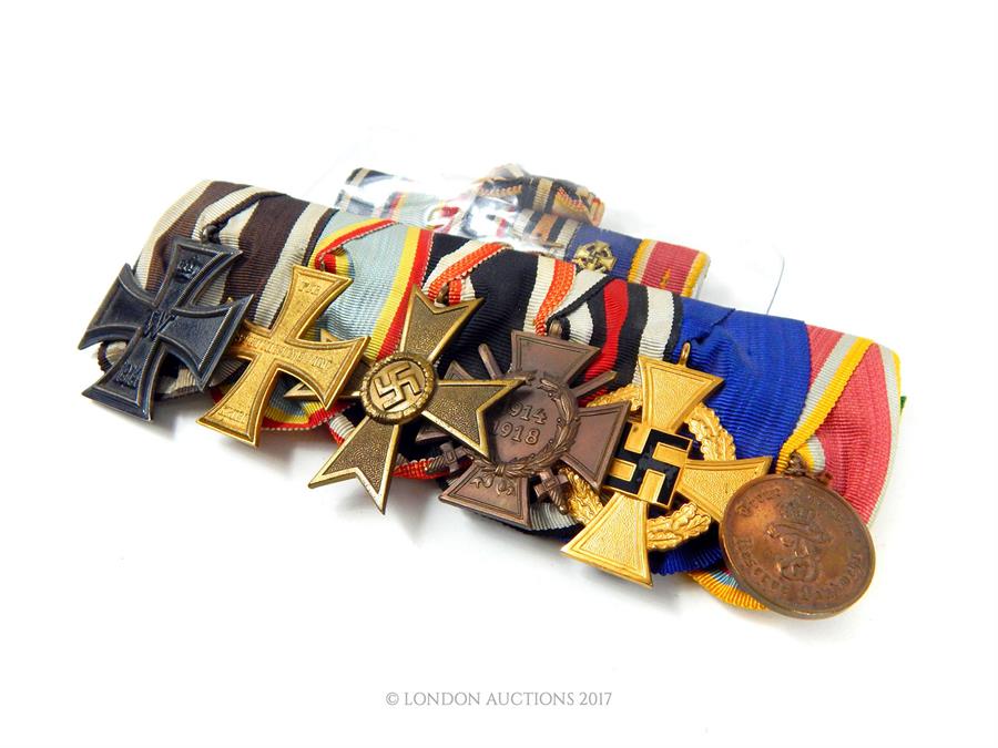 A group of six German medals including: Iron Cross 1914 second class; Military Merit Cross 1914; - Image 2 of 2