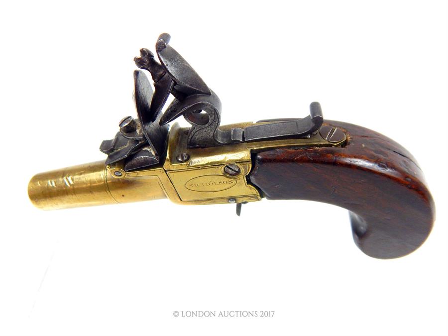 A Nicholson of London, pocket brass flintlock pistol with and walnut stock; unscrewable style barrel - Image 2 of 2