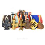 A group of six German medals including: Iron Cross 1914 second class; Military Merit Cross 1914;