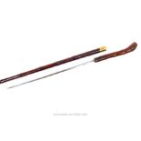 A 19th century Bamboo sword stick, with short blade (39.5cm long).