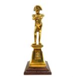 A gilt bronze statue of Napoleon Bonaparte raised upon a plinth; 34cm high.