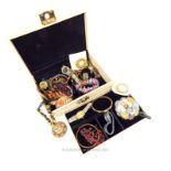 A jewellery box containing a collection of costume jewellery