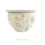 A Chinese Blanc de Chine porcelain jardiniere