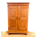 A Continental pine cabinet