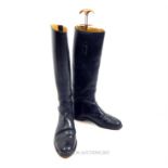 A pair of "Brookson", black riding boots; size 9.