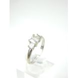 A 9ct white gold and ascher cut white stone ring