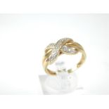 A 9 ct yellow gold and diamond cross-over ring