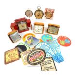 A collection of vintage, travel/ alarm clocks