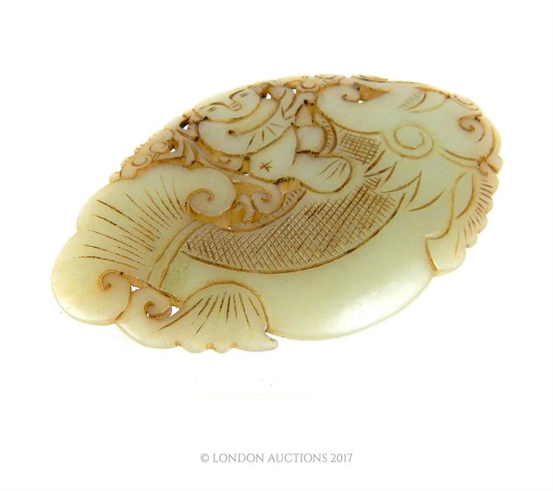 A Chinese jade carving of a figure riding a fish - Image 2 of 2