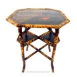 A Victorian Aesthetic movement japanned bamboo side table.