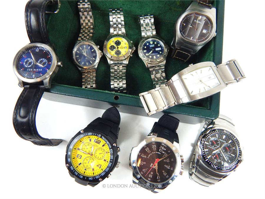 A green leather box containing nine assorted gentleman's, stainless steel wristwatches - Image 2 of 2