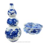A Chinese blue and white porcelain triple gourd vase with a Chinese blue and white jar