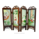 A Chinese miniature fourfold screen