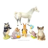 Six Beswick figures to include a white horse, a cat and Beatrix Potter examples