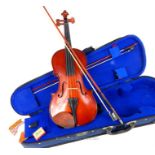 A 20th/21st century student's violin with two bows and padded case.