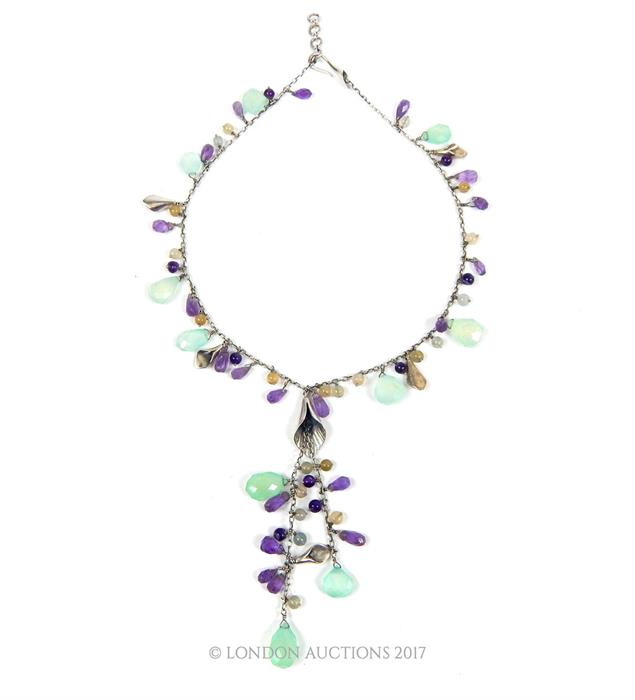 An elegant, long, sterling silver, amethyst, iolite and quartz drop necklace