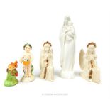 A small collection of ceramic figurines