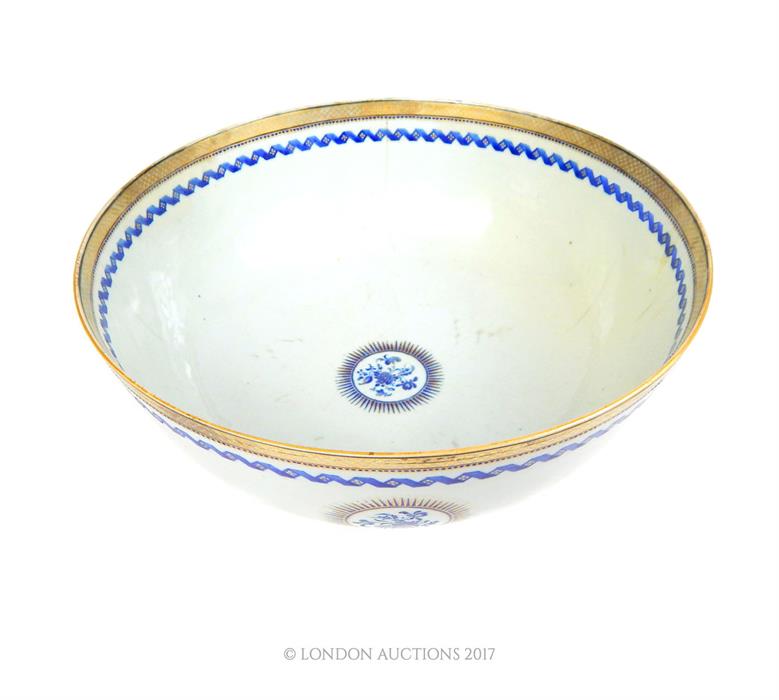 A large Eastern blue and white bowl with gilt decorated rim; 33cm diameter. - Image 2 of 2