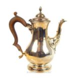 From the estate of the late Lady Wanda Boothby: a small Irish silver coffee pot with walnut