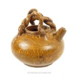 A Chinese Qing dynasty ewer with yellow marbled glaze; 9cm high.