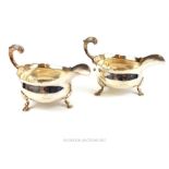 From the estate of Lady Wanda Boothby: a pair of large 19th century English silver sauce boats;