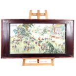 A large Chinese porcelain plaque, decorated in the famille rose palette