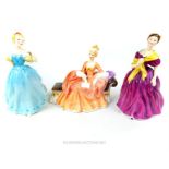From the estate of the late Lady Wanda Boothby: three Royal Doulton figurines of ladies: "