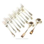 From the estate of the late Lady Wanda Boothby: ten silver forks and two silver ladles; overall 26.