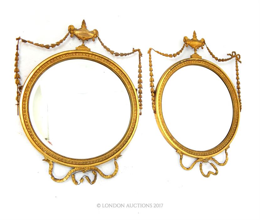 A pair of Edwardian Adams Revival circular bevelled plate mirrors, crested with urns and stags, 66 x - Image 2 of 2