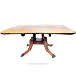 From the estate of the late Lady Wanda Boothby: a fine rosewood tilt-top table with a four