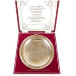 From the estate of the late Lady Wanda Boothby: a limited edition solid silver commemorative plate
