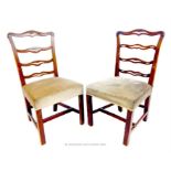From the estate of the late Lady Wanda Boothby: a pair of two upholstered chairs with wavy back