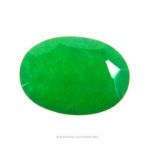 A large, natural, faceted, oval-shaped emerald (loose stone)