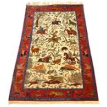 A superb quality, early 20th century, Persian, part silk rug adorned with hunting scenes